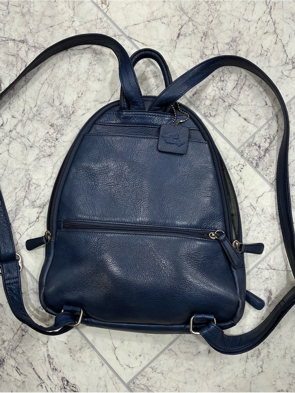 Osgoode Marley Navy Leather Teardrop Backpack with Top Handle.